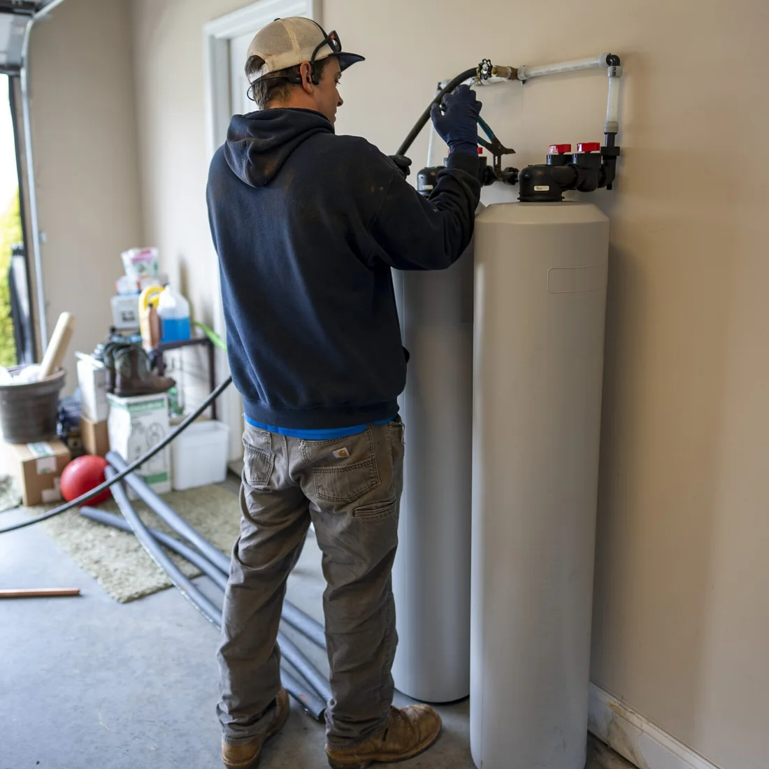 Aqua Clear technician installing a whole-home water system